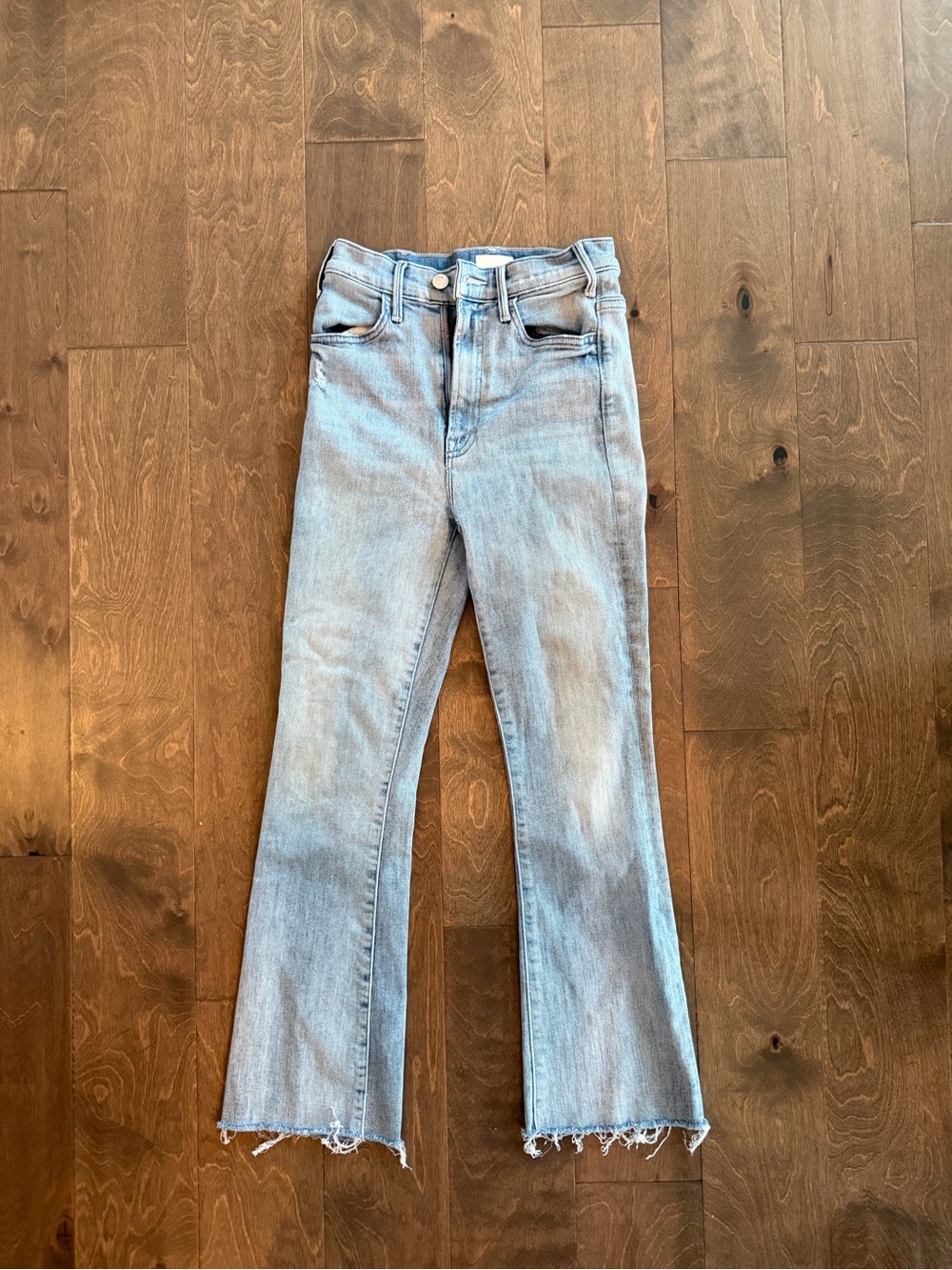 MOTHER Light Blue High-Rise Flare Jeans with Raw Hem